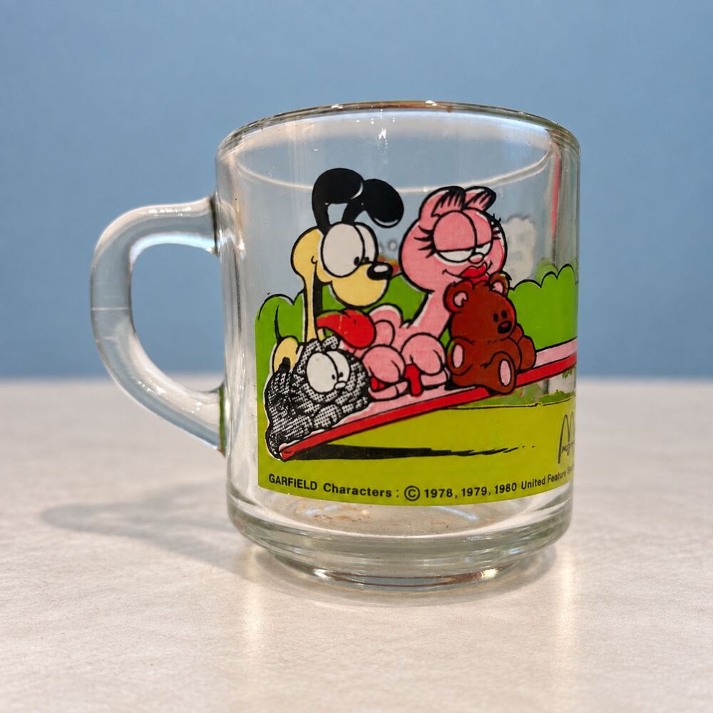 Vintage McDonald’s Garfield Glass Mug, Seesaw Design, 3½" H × 3" D